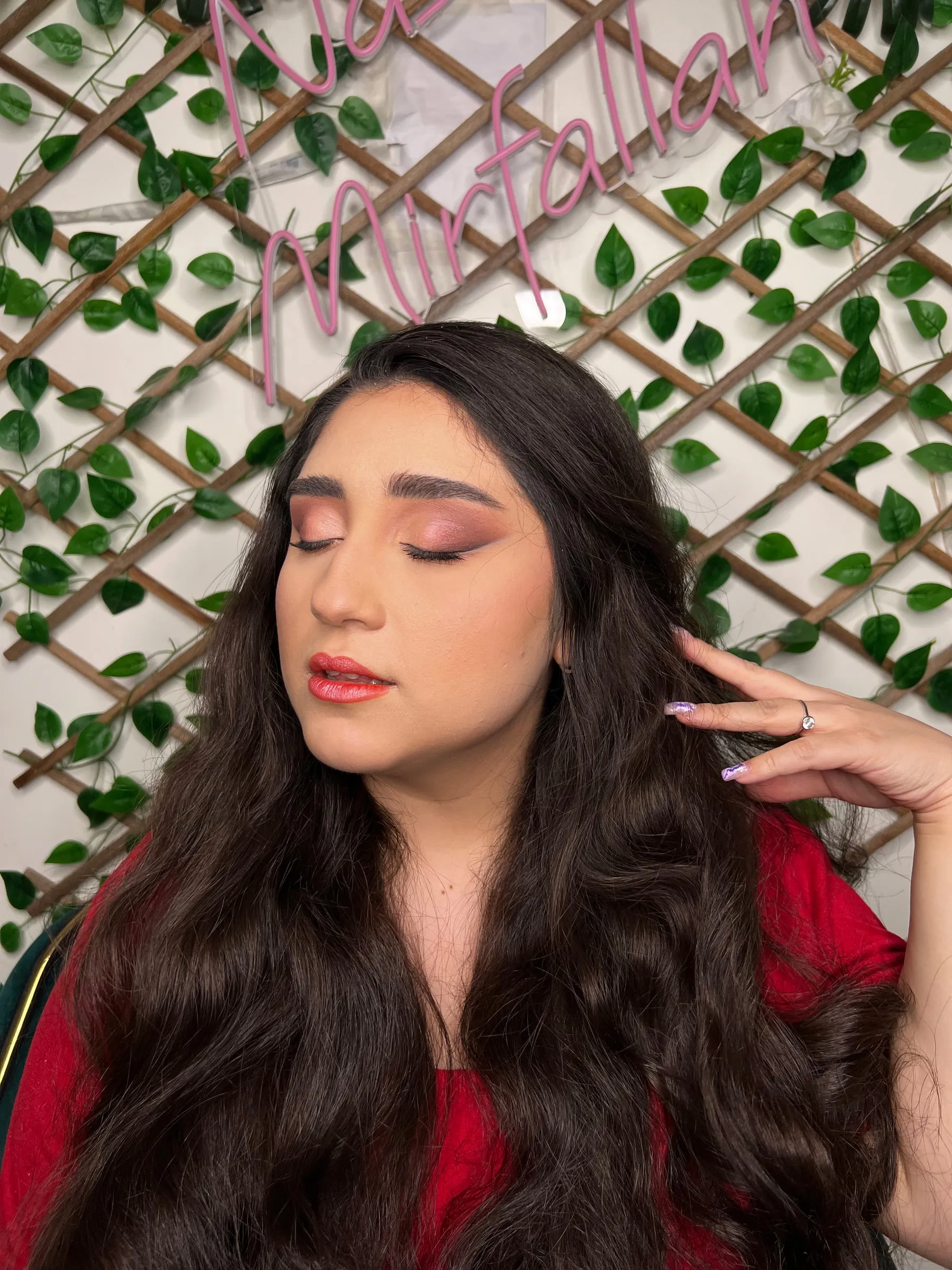 Rosy shimmer eyeshadow with a red lip and soft waves